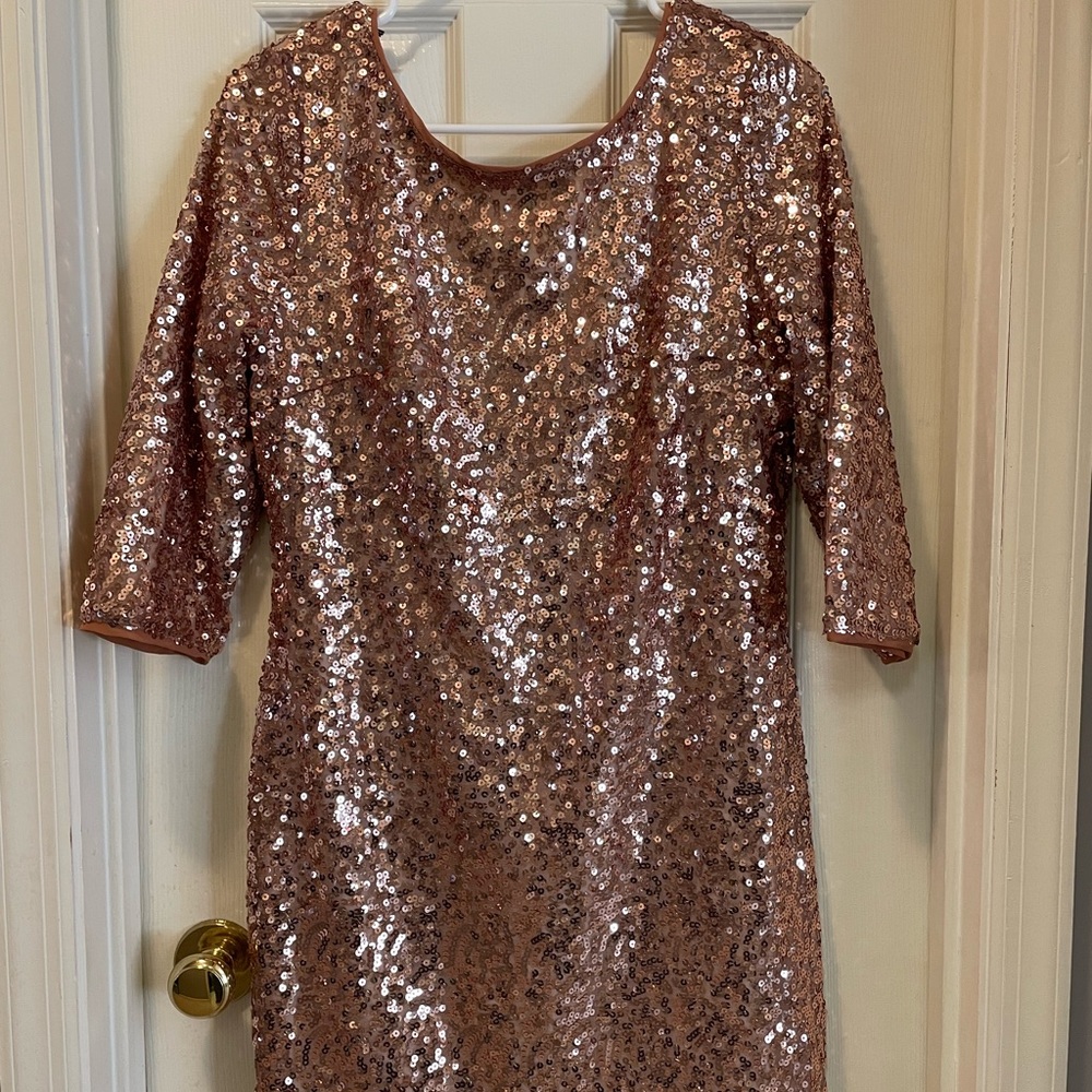 Forever 21 gold sequin dress. U neckline, low V back. Perfect for New Years Eve!